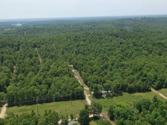 SOLD- 0.26 Acres Treed Land to Build or Invest near Lakes