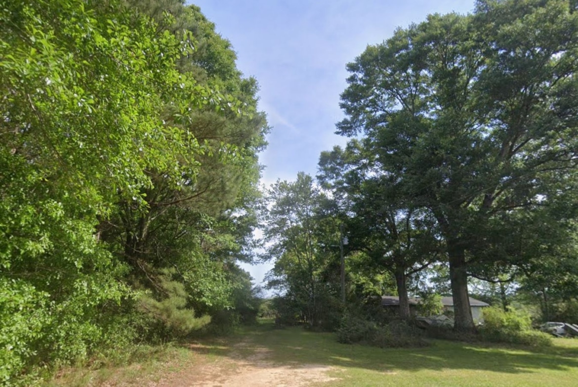 0.28 Acre Wooded Lot Near Lake!