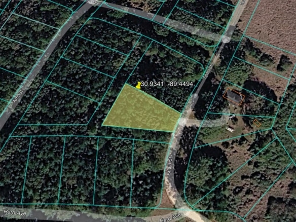 0.28 Acre Wooded Lot Near Lake!