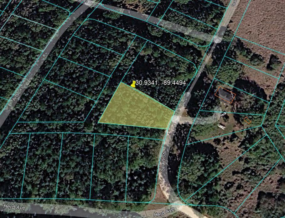 0.28 Acre Wooded Lot Near Lake!