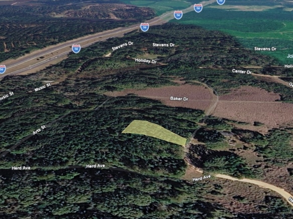 0.28 Acre Wooded Lot Near Lake!