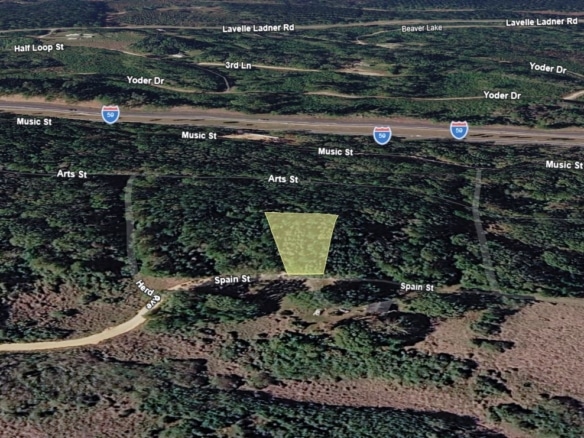0.28 Acre Wooded Lot Near Lake!