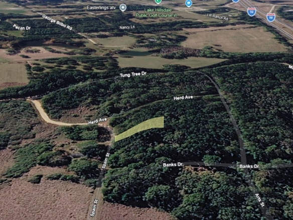 0.28 Acre Wooded Lot Near Lake!
