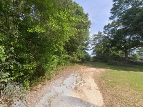 0.28 Acre Wooded Lot Near Lake!