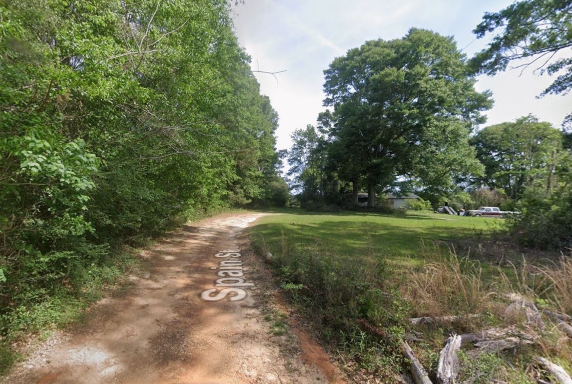 0.28 Acre Wooded Lot Near Lake!