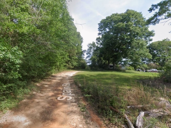 0.28 Acre Wooded Lot Near Lake!