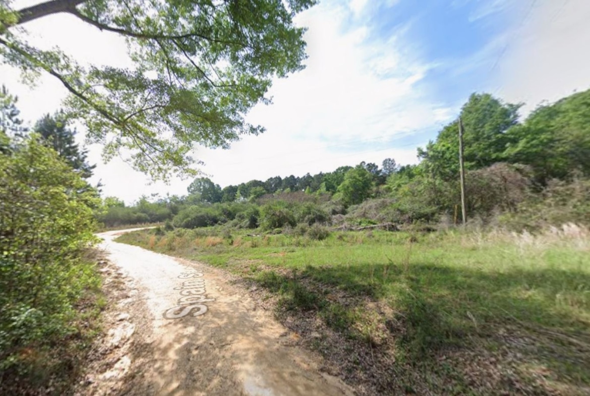 0.28 Acre Wooded Lot Near Lake!