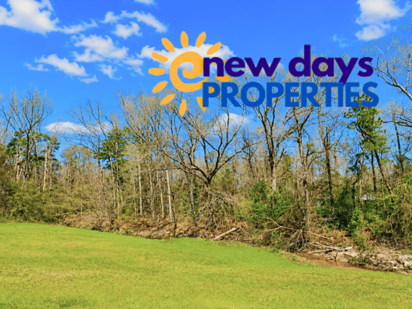 0.31 Acres with Highway Frontage & a Peaceful Creek!