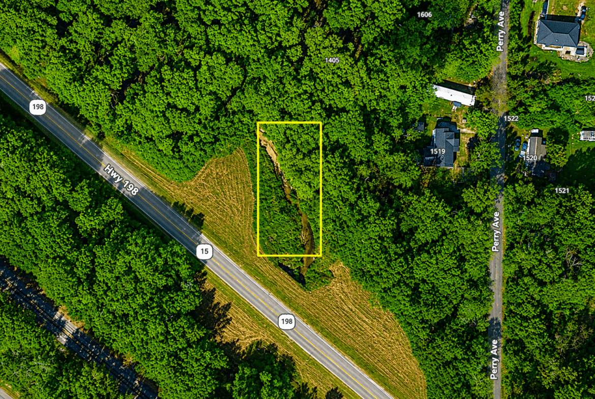 0.31 Acres with Highway Frontage & a Peaceful Creek!