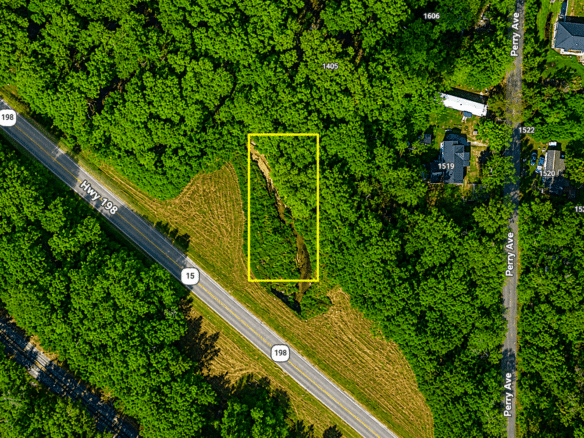 0.31 Acres with Highway Frontage & a Peaceful Creek!