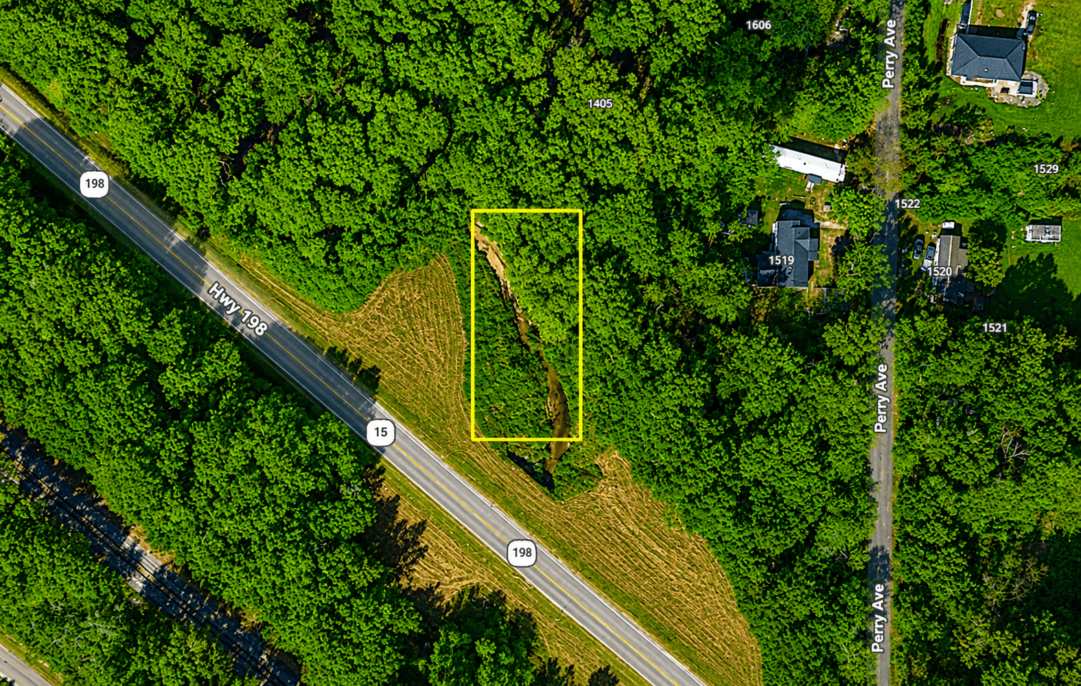 10 0.31 Acres with Highway Frontage & a Peaceful Creek!
