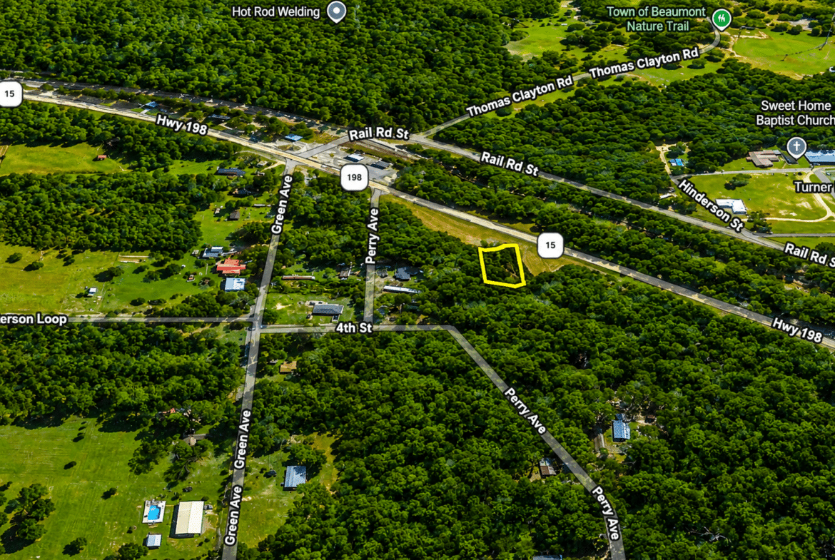 0.31 Acres with Highway Frontage & a Peaceful Creek!
