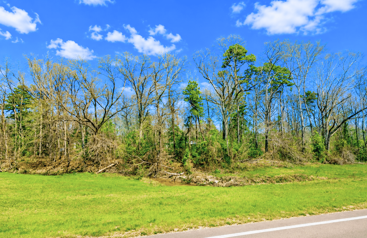 2 0.31 Acres with Highway Frontage & a Peaceful Creek!