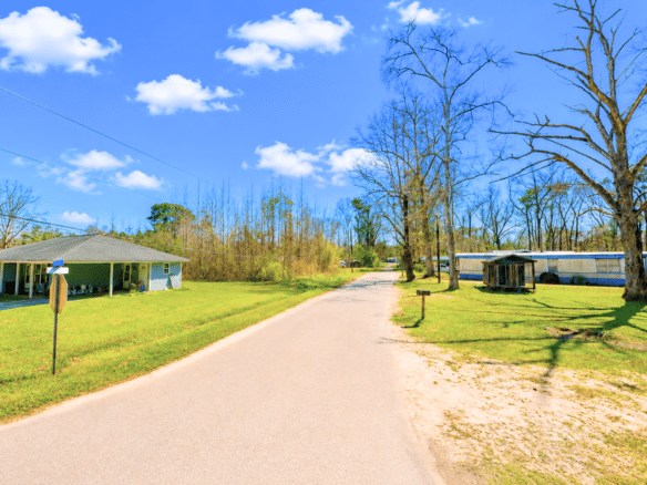 0.31 Acres with Highway Frontage & a Peaceful Creek!