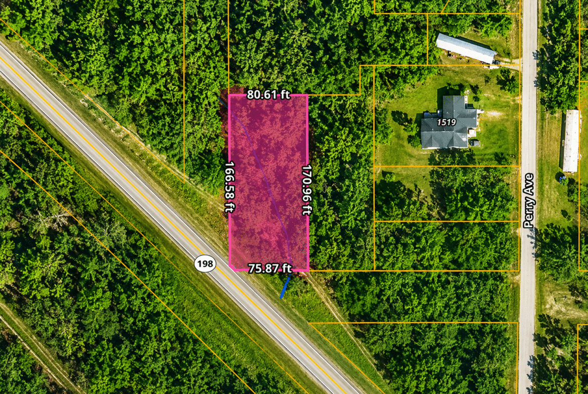 0.31 Acres with Highway Frontage & a Peaceful Creek!