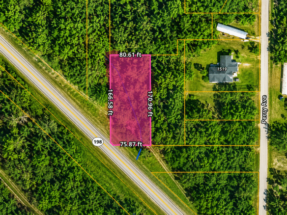 0.31 Acres with Highway Frontage & a Peaceful Creek!