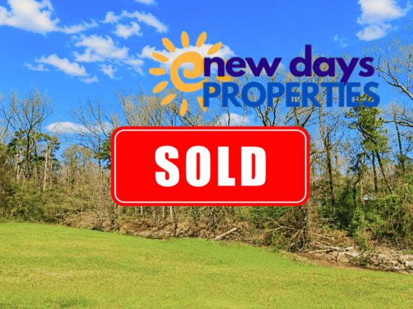 0.31 Acres with Highway Frontage & a Peaceful Creek!